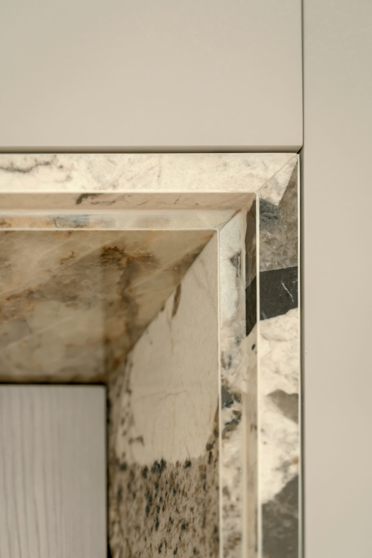 Close-up of marble mitred edge detail in luxury kitchen at Serenia Residences, Palm Jumeirah.